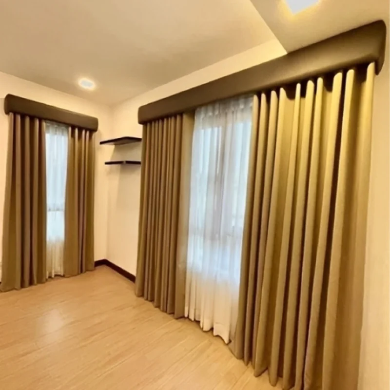 Curtains with Pelmet — A sculpted cornice that hides the track and elevates the window.